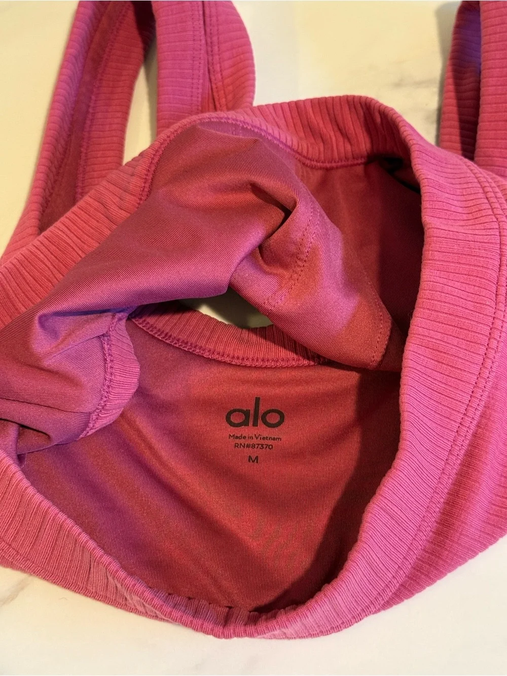 Alo pink ribbed sports bra